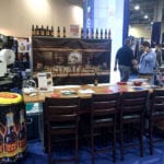 Engineering Innovation's saloon-themed booth with Triple X rootbeer at the 2014 Parcel Forum trade show.