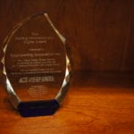2017 USPS glass, tear-drop shaped award.