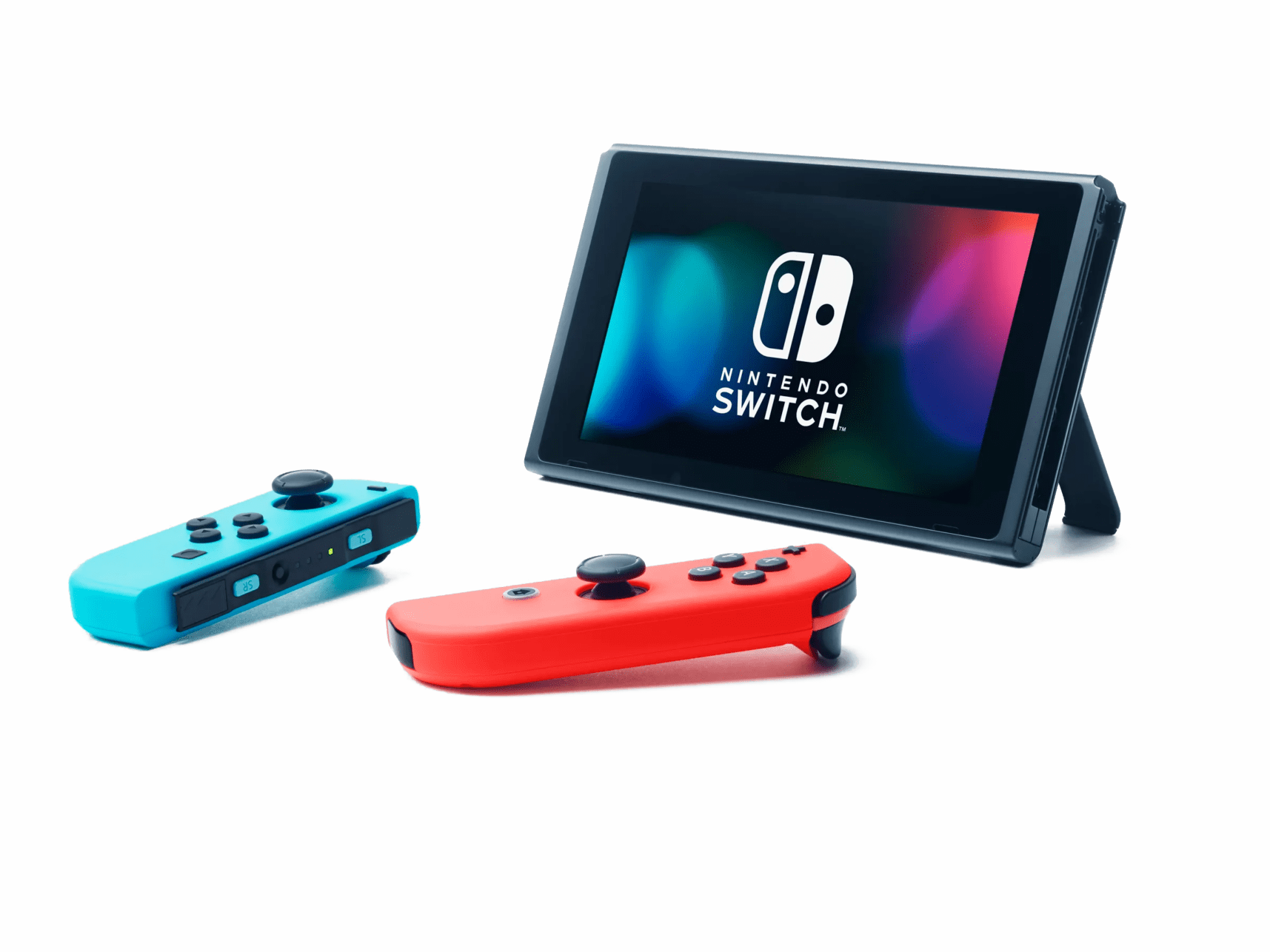 A Nintendo Switch console with its screen displaying the logo is propped up by its stand, much like a featured item in a Parcel Forum showcase. The console is accompanied by two detached Joy-Con controllers, one blue and one red, placed on a pristine white surface.